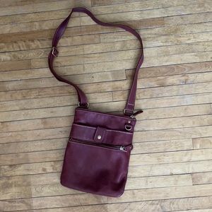 Barely used authentic roots crossbody